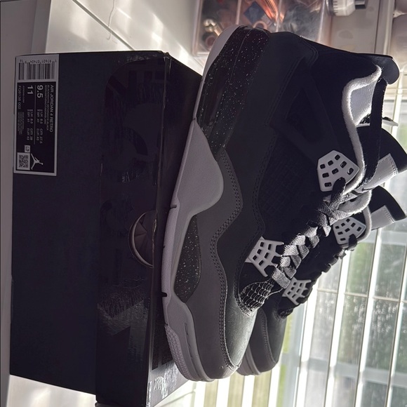 Black and White Air Jordan 4 retro 9.5